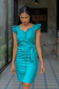 Jasmine - Ruffle Sleeve Sheath Dress is made of Turquoise Green Cotton and has buttons on front and with a sash belt