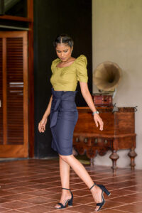 Alice - Pencil Skirt is made in Black Cotton is knee length and have a ruffle waist.