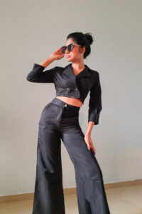 Black Polyester high waisted wide leg pant and Noori - Cropped Blazer Top is Double Breasted , with 3/4 length sleeves and a crop top