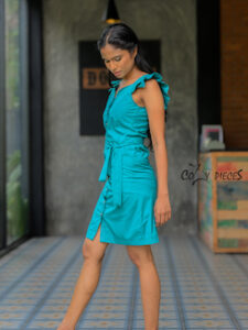 Jasmine - Sheath Dress is made of Turquoise Green Cotton and has buttons on front and with a sash belt